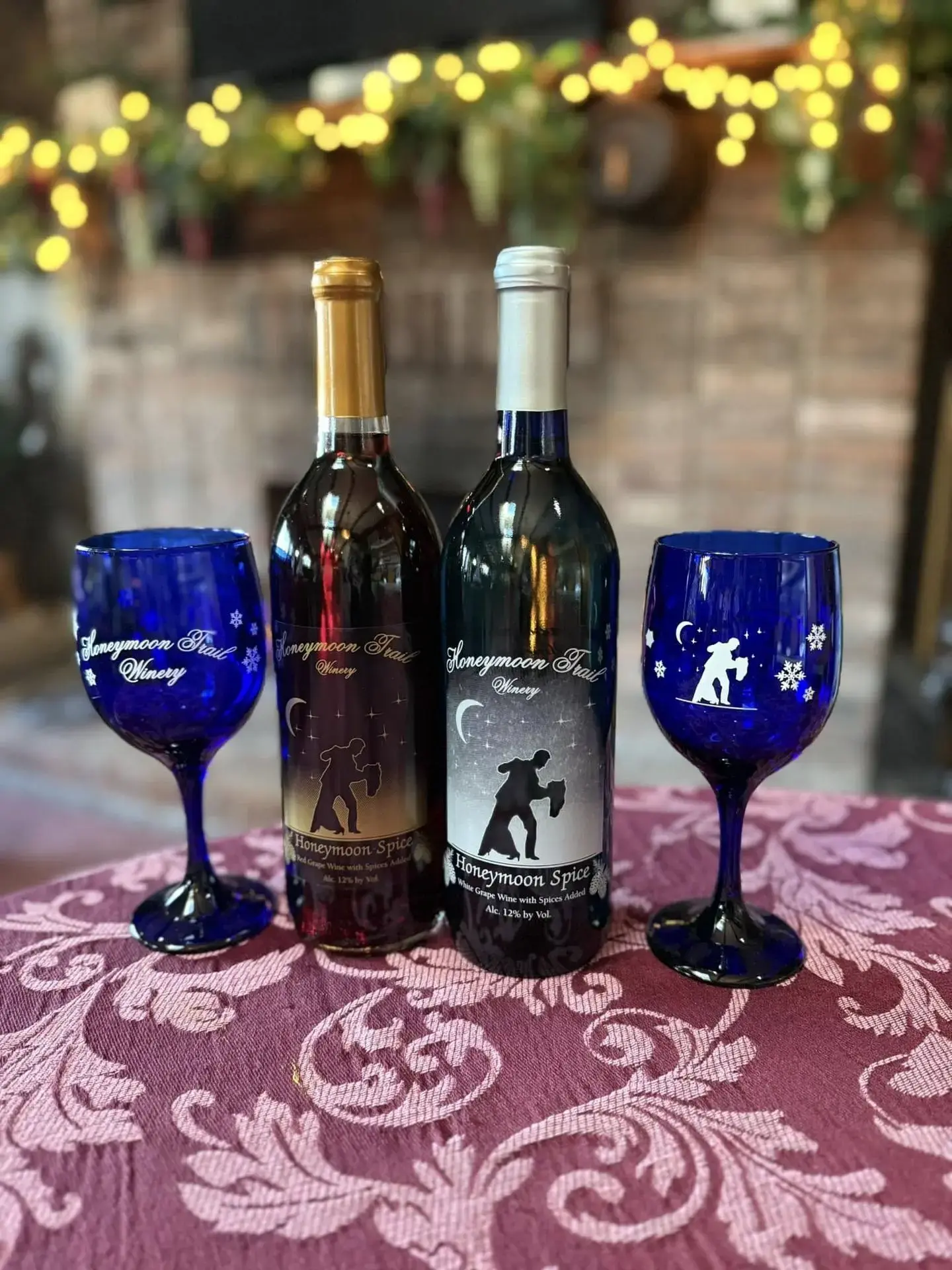 Honeymoon Spice red and white wines displayed with festive table setting